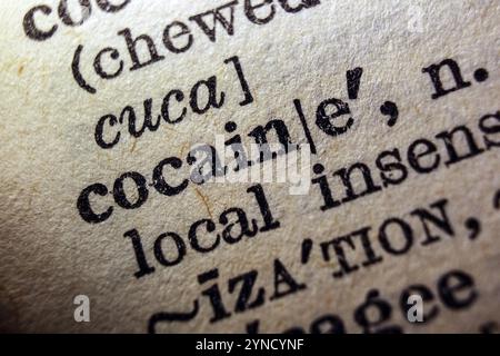 Word cocaine on dictionary page, macro close-up Stock Photo