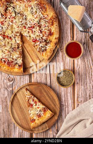 Food photography of pizza with Mozzarella, Cheddar  cheese, Parmesan, Chili, BBQ sauce, Pulled pork, Gourmet, Italian cuisine, Food, Rustic style Stock Photo