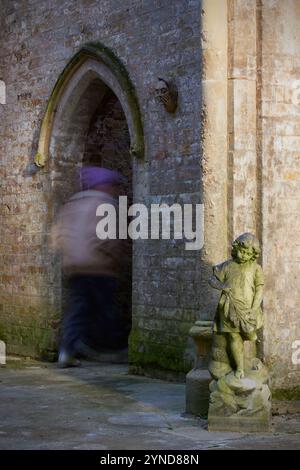 Boy exploring the Chapel at Nunhead Cemetery, Nunhead, London, England, Great Britain Stock Photo