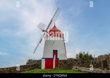 The windmill on Pico das Mentiras is overlooking the town of Santa Cruz da Graciosa, Azores. Stock Photo