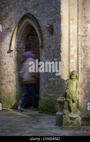 Boy exploring the Chapel at Nunhead Cemetery, Nunhead, London, England, Great Britain Stock Photo