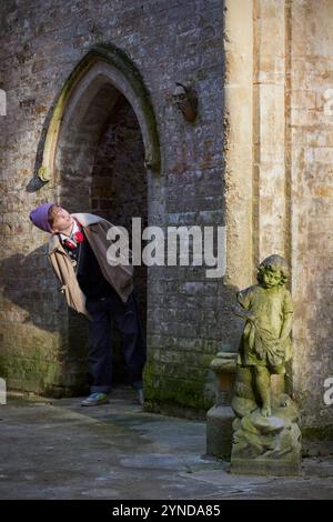 Boy exploring the Chapel at Nunhead Cemetery, Nunhead, London, England, Great Britain Stock Photo