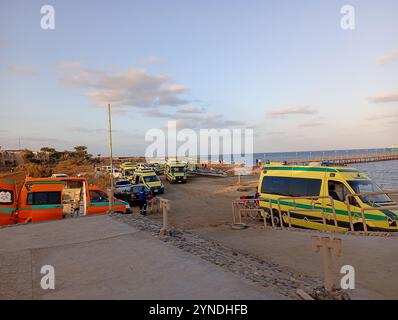 Marsa Alam, Egypt. 25th Nov, 2024. Rescuers and ambulance cars wait on the beach for possible survivors after a boat sank at a harbour in Marsa Alam. Seventeen people remain missing after a tourist boat carrying 45 people capsized in the Red Sea, Egyptian authorities said on Monday. Credit: Stringer/dpa/Alamy Live News Stock Photo
