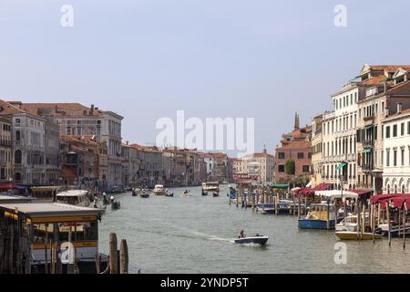 Boats on a Venetian canal between old buildings in sunny weather, Grand Canal, Venice, Italy, Europe Stock Photo