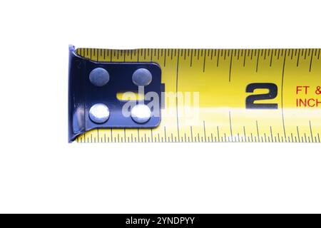 Close up to a Tape Measure, a tape measure or measuring tape is a flexible ruler used to measure size or distance Stock Photo