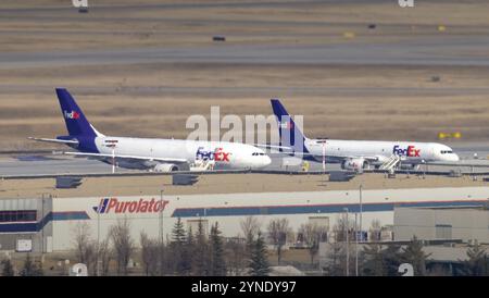 Calgary, Alberta, Canada. Mar 17, 2024. A couple of FedEx planes at the Calgary Airport Stock Photo