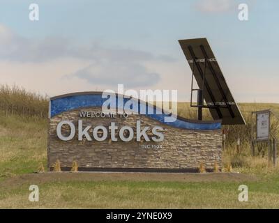 Calgary, Alberta, Canada. May 7, 2023. A welcome sign to the Okotoks town. A town in the Calgary Region of Alberta, Canada. It is on the Sheep River, Stock Photo