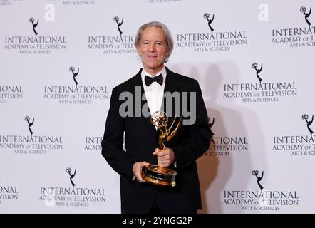 New York, United States. 25th Nov, 2024. US writer, producer David E. Kelley poses with the Founders award in the press room at the 52nd International Emmy Awards at New York Hilton Midtown in New York City on Monday, November 25, 2024. Photo by John Angelillo/UPI Credit: UPI/Alamy Live News Stock Photo