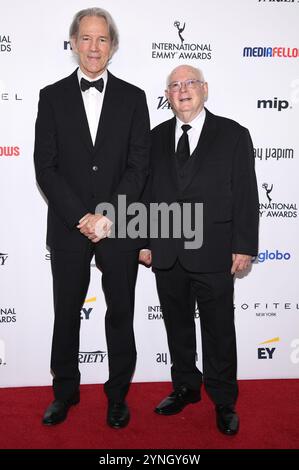 New York, USA. 25th Nov, 2024. (L-R) David E. Kelley and US television and film producer Michael Pressman attend the 52nd International Emmy Awards at the New York Hilton, New York, NY, November 25, 2024. (Photo by Anthony Behar/Sipa USA) Credit: Sipa USA/Alamy Live News Stock Photo