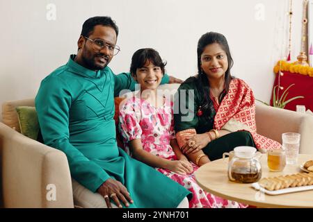 Celebrating Family Time in Cozy Living Room Setting Stock Photo