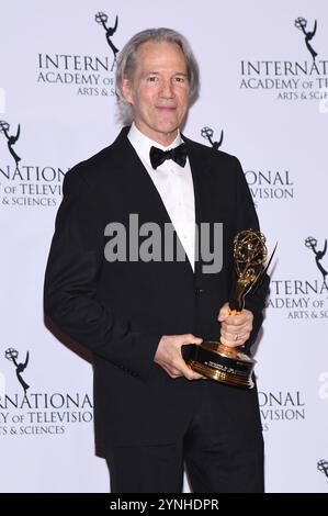 New York, USA. 25th Nov, 2024. US writer/producer David E. Kelley poses with the Founders award in the press room during the 52nd International Emmy Awards at the New York Hilton, New York, NY, November 25, 2024. (Photo by Anthony Behar/Sipa USA) Credit: Sipa USA/Alamy Live News Stock Photo