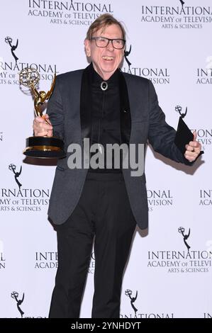 New York, USA. 25th Nov, 2024. English actor Timothy Spall poses with the award for Best Performance by an Actor for 'The Sixth Commandment' in the press room during the 52nd International Emmy Awards at the New York Hilton, New York, NY, November 25, 2024. (Photo by Anthony Behar/Sipa USA) Credit: Sipa USA/Alamy Live News Stock Photo