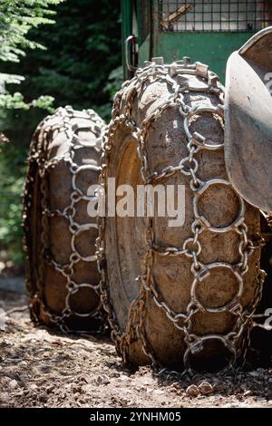 Giant wheels equipped with chains for mud. Stock Photo