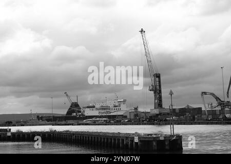 Poole, Dorset, England. 2nd October 2024. Grayscale scene in the harbour including a large Condor ferry boat. Stock Photo