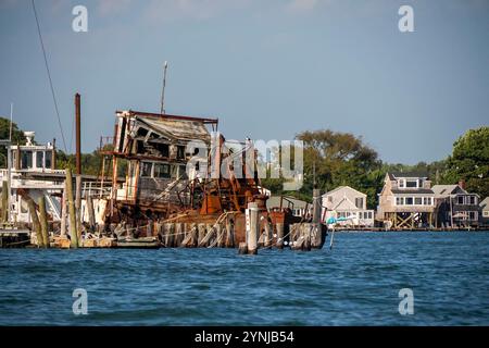 old abandoned rusted ship in harbor port of greenport long island new york view Stock Photo