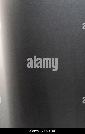 Reflective brushed gray metal material texture background close up view Stock Photo