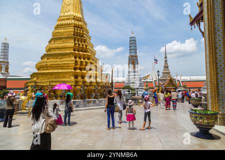 Bangkok Thailand: 17 August 2020: Tourists visiting Wat Phra Kaew, the Temple of the Emerald Buddha, in Bangkok Thailand. Wat Phra Kaew, located in th Stock Photo