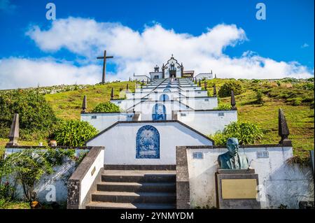 A view up steps towards Chapel of Our Lady of Peace above Ribeira Seca on the island of San Miguel in the Azores in summertime Stock Photo