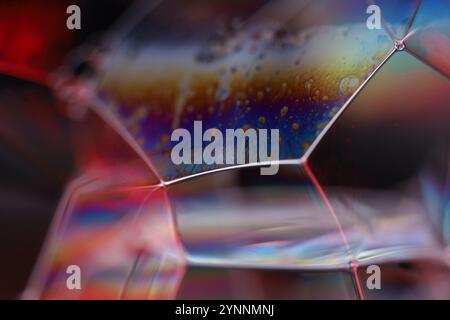 Silver liquid connections, bubble in macro, movement of liquid in a bubble, abstract background, surrealistic flow Stock Photo