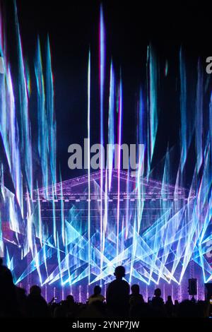 Spectacular bright open air laser show performance at the city festival Stock Photo