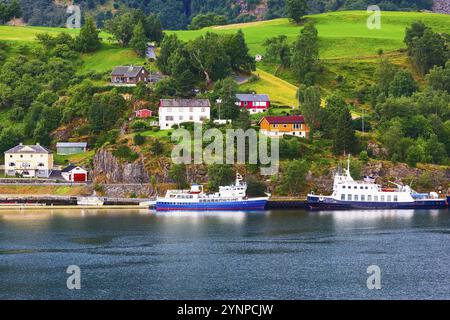 Norwegian fjord village and Sognefjord landscape in Flam, Norway. Tourism vacation and travel background Stock Photo