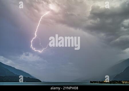 A strong thunderstorm with lots of lightning over Lake Como Stock Photo