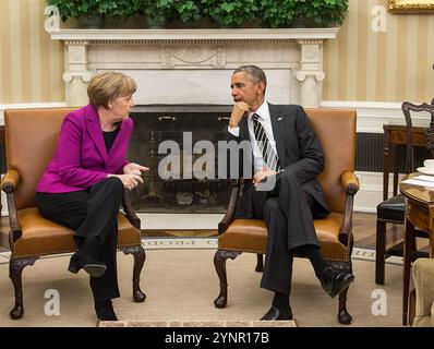 ANGELA MERKEL, German Chancellor,with  US President Barack Obama in the White House Oval Office in 2015. Stock Photo