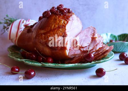 Baked Ham with Cherry and Maple Syrup Glaze. Stock Photo