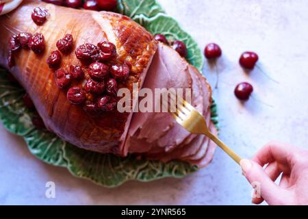 Baked Ham with Cherry and Maple Syrup Glaze. Stock Photo