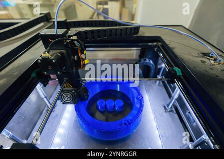 3D printing process of plastic machine part. Stock Photo
