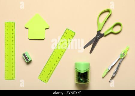 Set of bright stationery with plastic rulers on color background Stock Photo