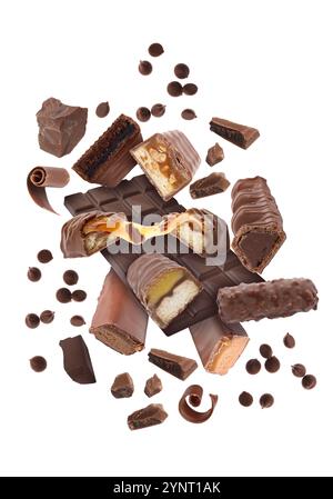 Different chocolate products in air on white background Stock Photo