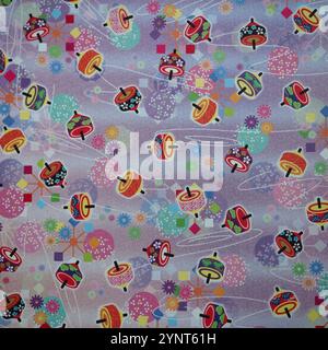 Traditional Japanese patterns with new year theme. A colorful Japanese patterns with flowers and toys played on Japanese new year Stock Photo