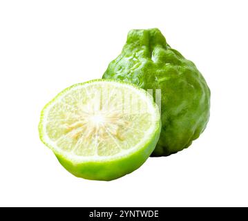 Front view of fresh green bergamot fruits or kaffir lime with half but no green leaf in stack is isolated on white background with clipping path. Stock Photo