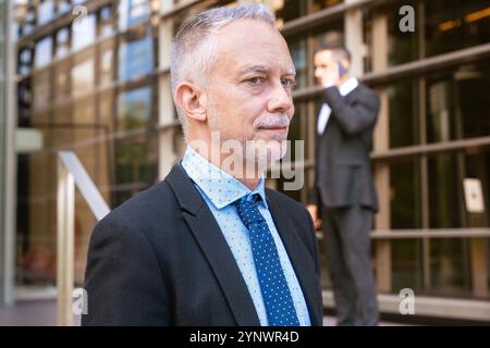 Confident Senior Businessman Outdoors in Professional Attire. Stock Photo