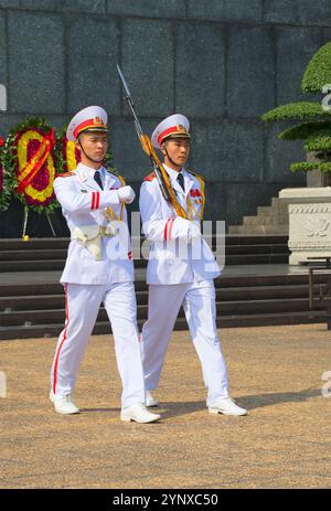 HANOI, VIETNAM - JANUARY 10, 2016: Soldiers march at Ho Chi Minh Mausoleum. Hanoi Stock Photo