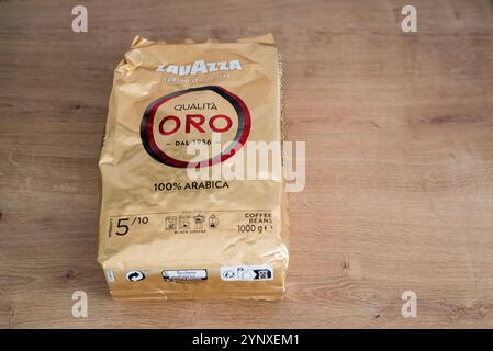 Minsk, Belarus, November 27, 2024 - Top view Italian brand coffee Lavazza Oro in beans in a bag Stock Photo