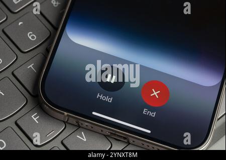 New York, USA - November 26, 2024: Google AI gemini voice assistance on screen in keyboard button background close up view Stock Photo