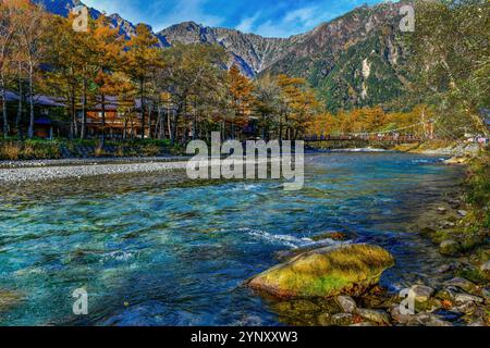 Beautiful mountain in autumn leaf and Azusa river, Kamikochi National Park ,Nagano, Japan Stock Photo