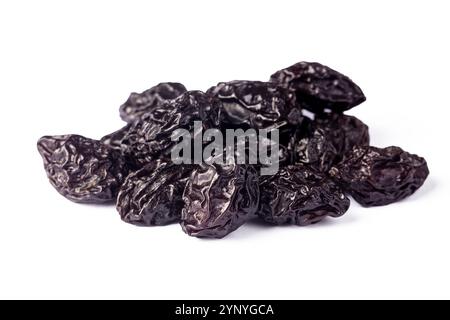 Dried plum fruit on a white background. Stock Photo