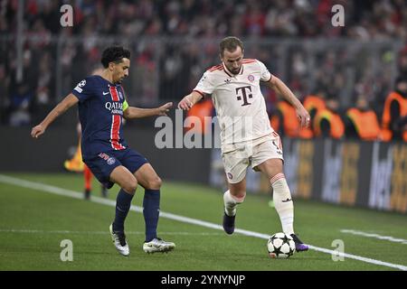 duel, action Harry Kane FC Bayern Muenchen FCB (09) vs Marquinhos FC Paris Saint-Germain PSG (05) Champions League, Allianz Arena, Munich, Bayern, Ger Stock Photo