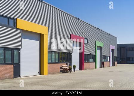 Modern business units with colorful roller doors Stock Photo