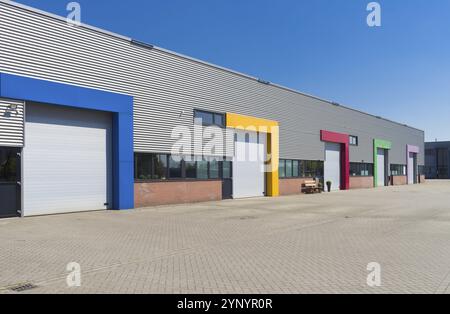 Modern business units with colorful roller doors Stock Photo