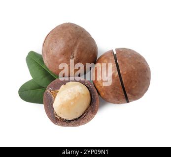 Macadamia nuts with shells isolated on white, top view Stock Photo