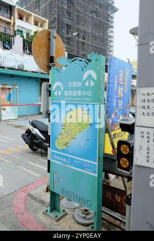 Sign with map pointing to the Liouciou Visitor Center on the island of Xiao Liuqiu, Pingtung County, Taiwan; Liuqiu tourism and tourist information. Stock Photo