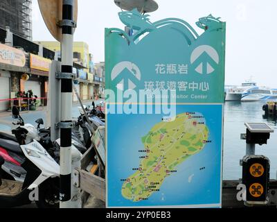 Sign with map pointing to the Liouciou Visitor Center on the island of Xiao Liuqiu, Pingtung County, Taiwan; Liuqiu tourism and tourist information. Stock Photo