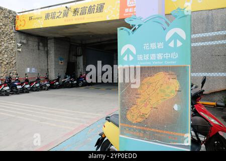 Sign with map pointing to the Liouciou Visitor Center on the island of Xiao Liuqiu, Pingtung County, Taiwan; Liuqiu tourism and tourist information. Stock Photo