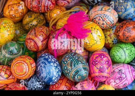 Colorful Easter eggs decorated with traditional patterns serve as festive decorations during the Easter season, symbolizing celebration and renewal Stock Photo