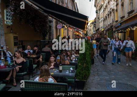 24.08.2024, Ukraine, Lviv oblast, Lviv - Street cafÈ in the old town centre, on the UNESCO World Heritage List since 1998. 00A240824D528CAROEX.JPG [MO Stock Photo