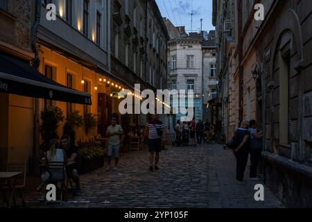 27.08.2024, Ukraine, Lviv oblast, Lviv - Street cafÈ in the old town centre, on the UNESCO World Heritage List since 1998. 00A240827D036CAROEX.JPG [MO Stock Photo